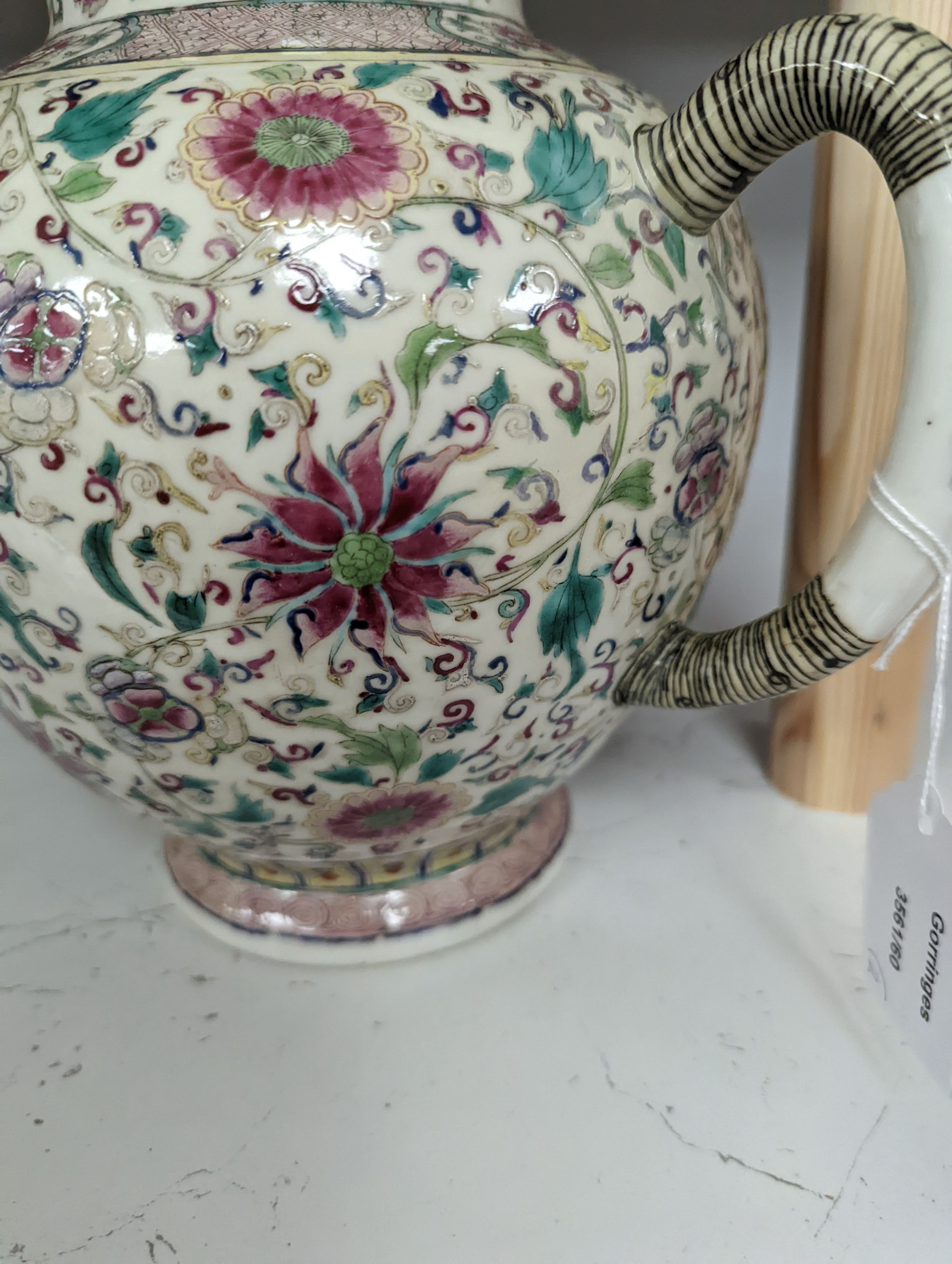 A large 19th century Chinese famille rose wine pot, and another wine pot, tallest 27cm